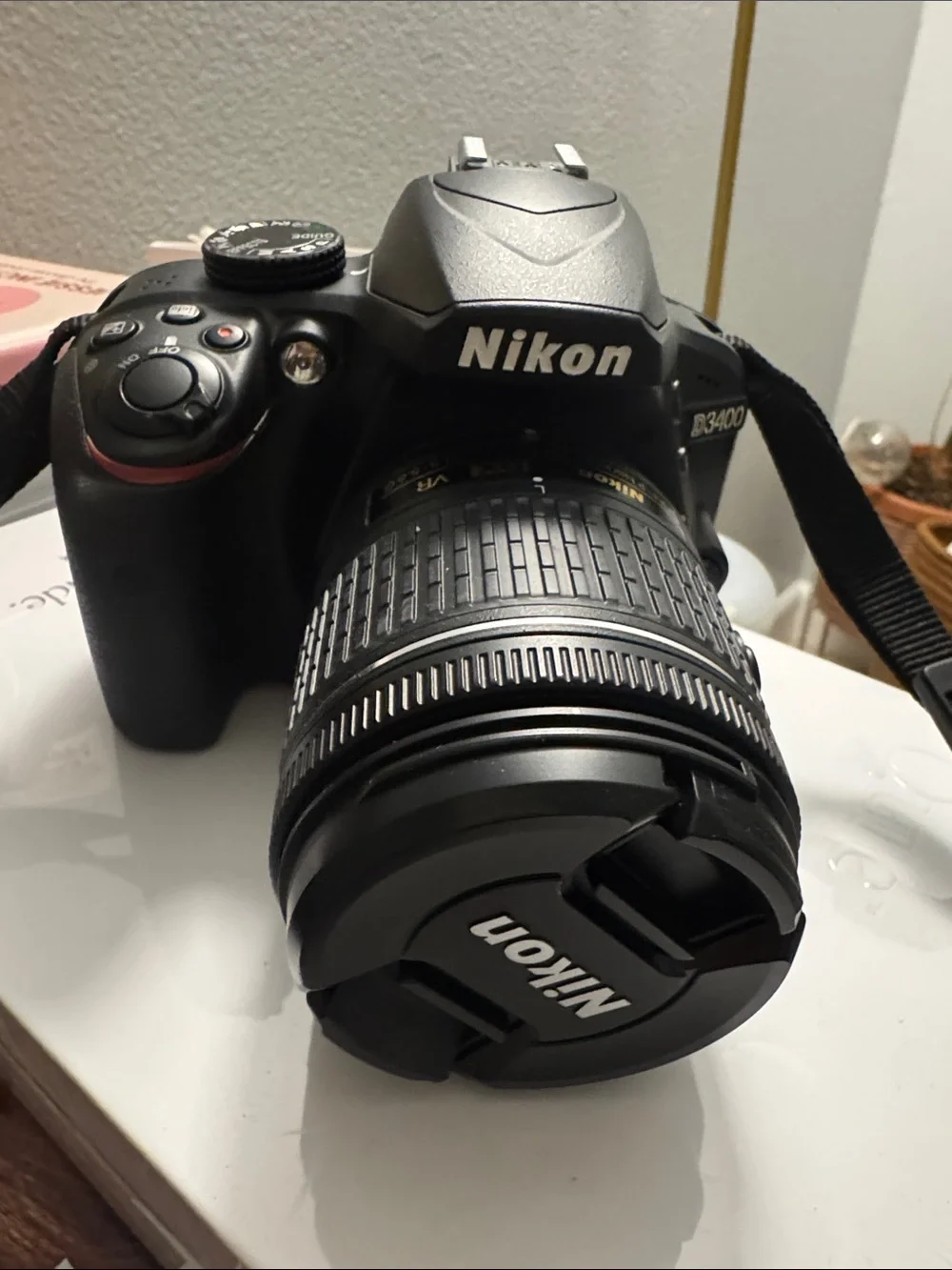 Nikon D3400 DSLR Camera in Black with Lens Cap